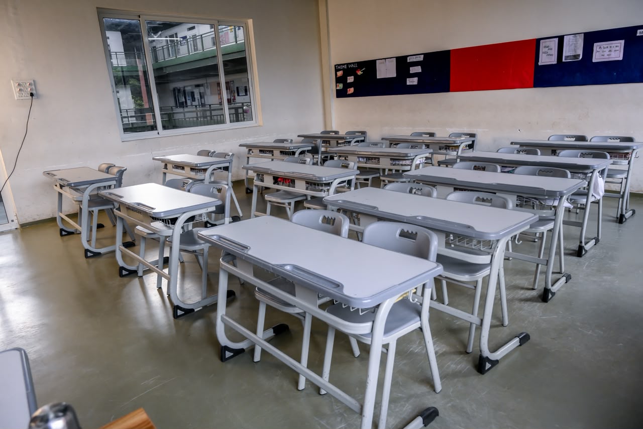 School desks and chairs in a modern classroom